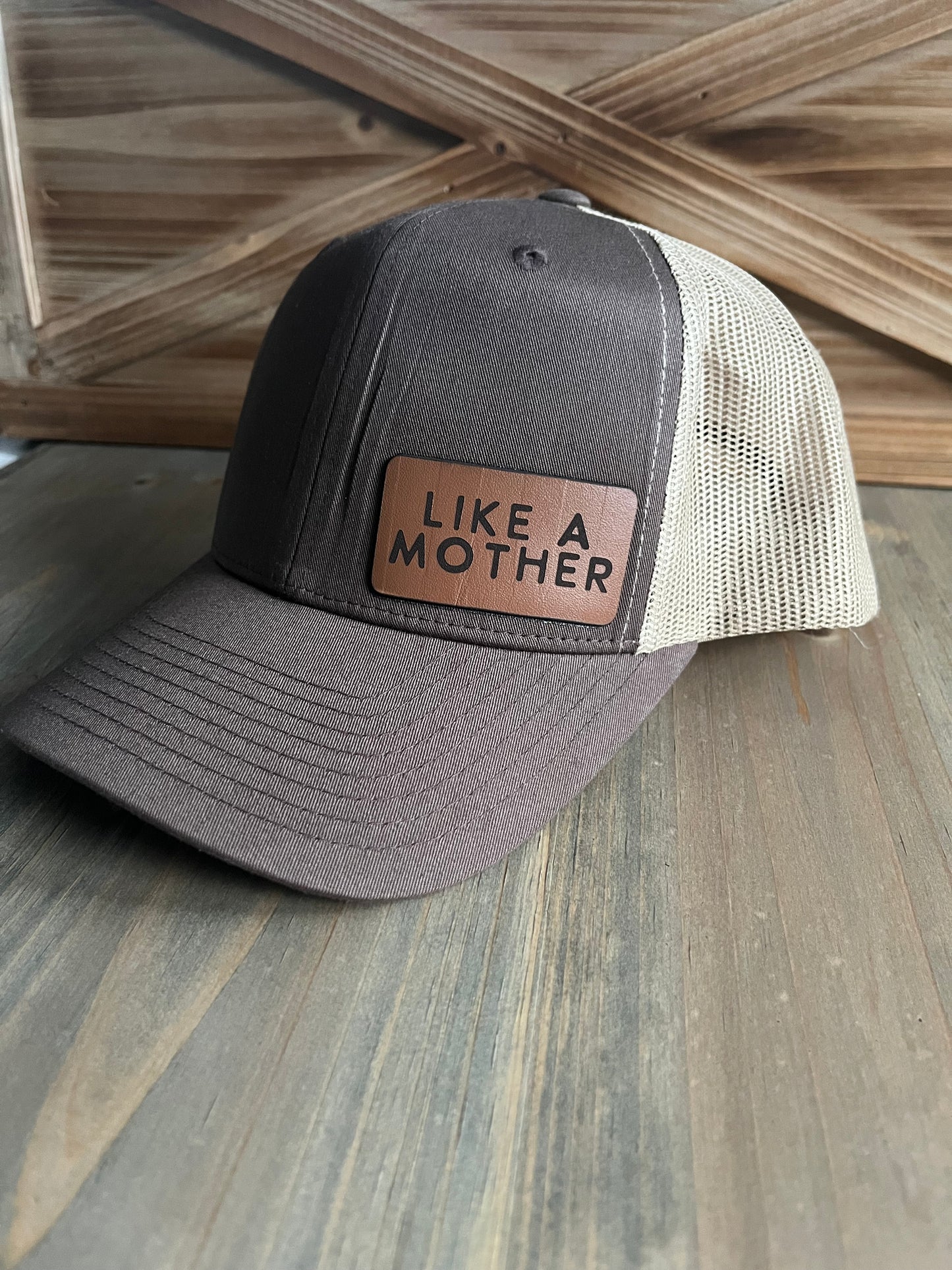 LIKE A MOTHER BROWN TRUCKER HAT